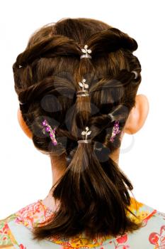 Close-up of a hairstyle of a girl isolated over white