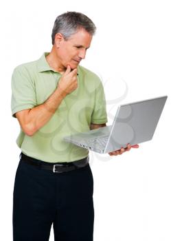 Thinking man using a laptop isolated over white