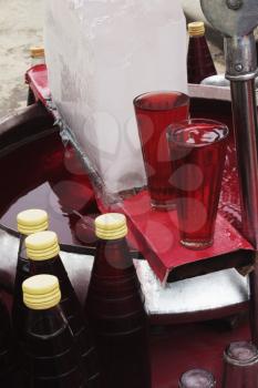 Two glasses of drink at a market stall, New Delhi, India