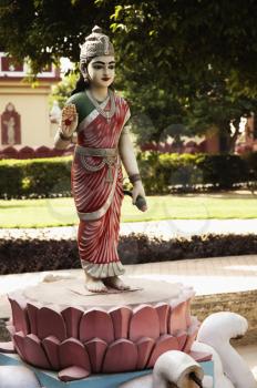 Statue of goddess Lakshmi in the garden of a temple, Lakshmi Narayan Temple, New Delhi, India