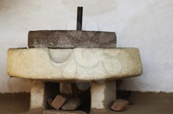 Close-up of a traditional stone grinder, Agra, Uttar Pradesh, India