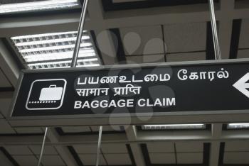 Baggage claim sign at an airport, New Delhi, India