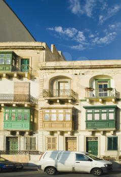 Cars parked in front of a building, Valetta, Malta