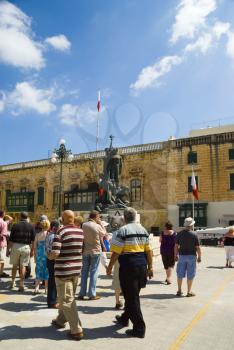 Tourists at a town square, Sette Giugno Riots, Valletta, Malta