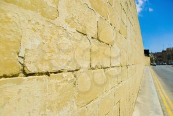Stone wall along the road, Valletta, Malta