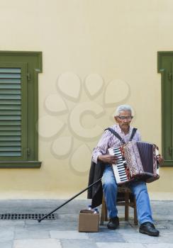 Man playing an accordion, Athens, Greece