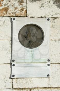 Details of a memorial plaque on a wall, Athens, Greece