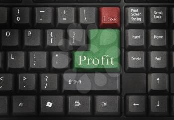 Close-up of a computer keyboard with profit and loss keys