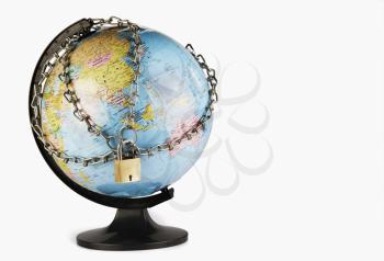 Globe with chains around it