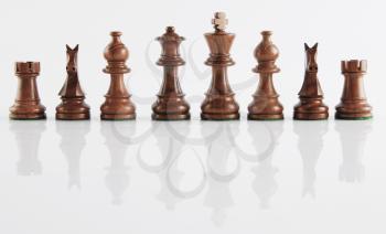 Chess pieces in a row