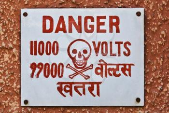 High Voltage warning signboard on a wall, Gurgaon, Haryana, India