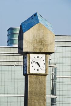 Clock tower in front of office buildings, Gurgaon, Haryana, India