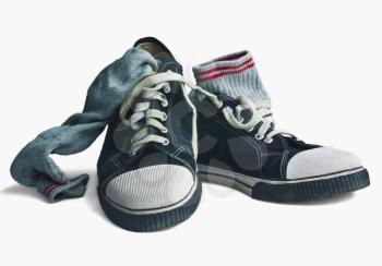 Close-up of a pair of canvas shoes with socks