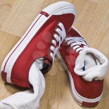 Close-up of a pair of canvas shoes with socks