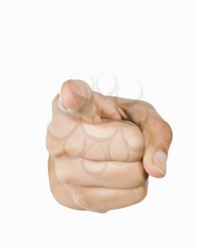 Close-up of a person's hand pointing forward