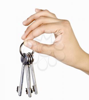 Close-up of a person's hand holding keys