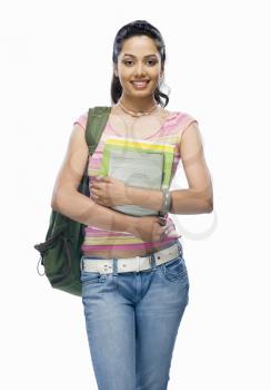 Portrait of a female college student holding files