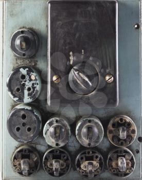 Close-up of old lightswitches and sockets