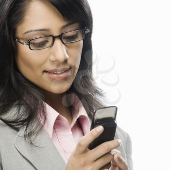 Businesswoman text messaging