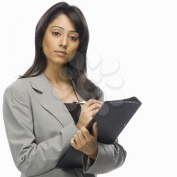 Portrait of a businesswoman holding a file