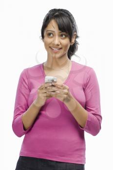 Young woman text messaging