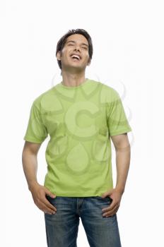 Young male fashion model laughing