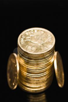 High angle view of a stack of gold coins