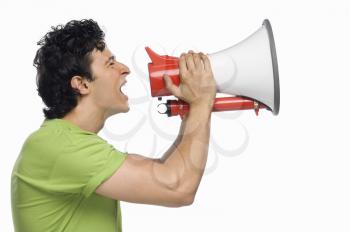 Man holding a megaphone and shouting