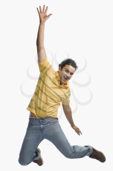 Portrait of a man jumping in excitement