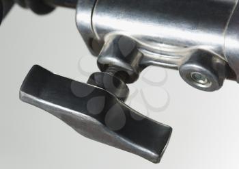 Close-up of a tripod knob