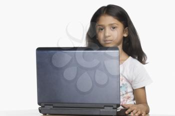 Portrait of a girl using a laptop