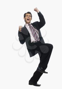 Close-up of a businessman cheering