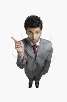 Businessman making a face and pointing