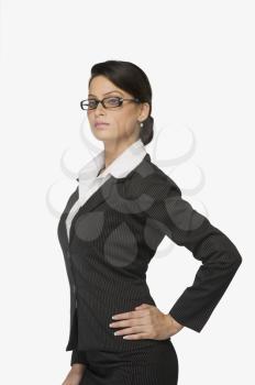 Businesswoman with hand on hip
