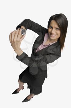 Businesswoman showing a wristwatch