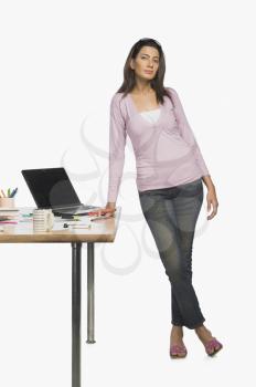 Female fashion designer standing in her office