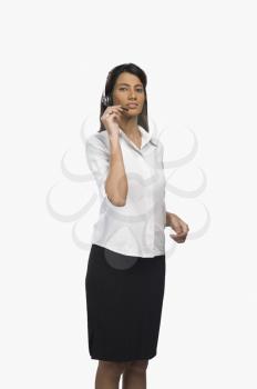 Female customer service representative using a headset