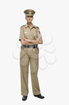 Portrait of a female police officer with her arms crossed