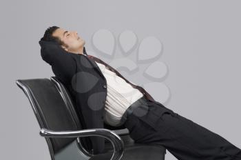 Businessman relaxing on a chair