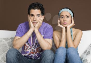 Portrait of a couple looking stressed