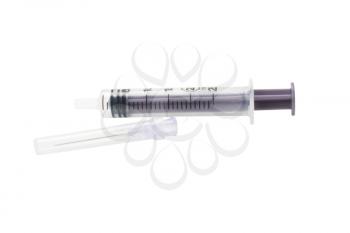 Close-up of a syringe with needle