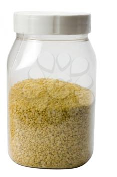 Close-up of mung pulses in a plastic jar