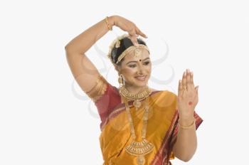 South Indian woman making hand gesture