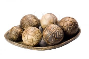 Close-up of decorative wooden balls on a tray