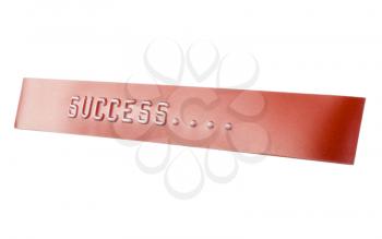 Close-up of word Success on a label
