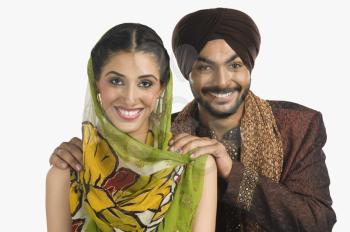 Portrait of a Sikh couple smiling