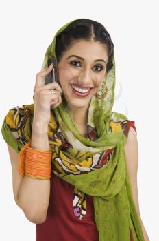 Sikh woman talking on a mobile phone