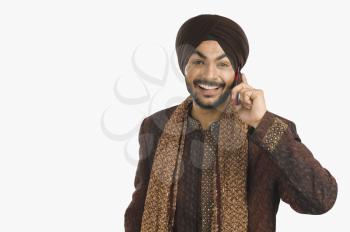 Sikh man talking on a mobile phone