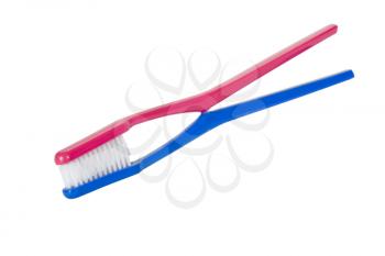 Close-up of two toothbrushes depicting togetherness