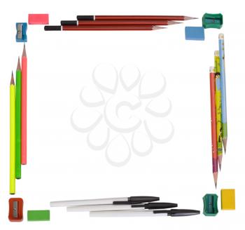 Close-up of stationery items arranged in rectangle shape